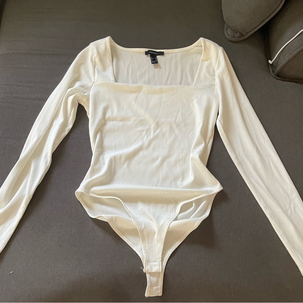 Cream body suit size M